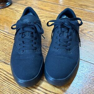 Nike SB Charge men’s black canvas sneakers.  Size 11.  Great condition.